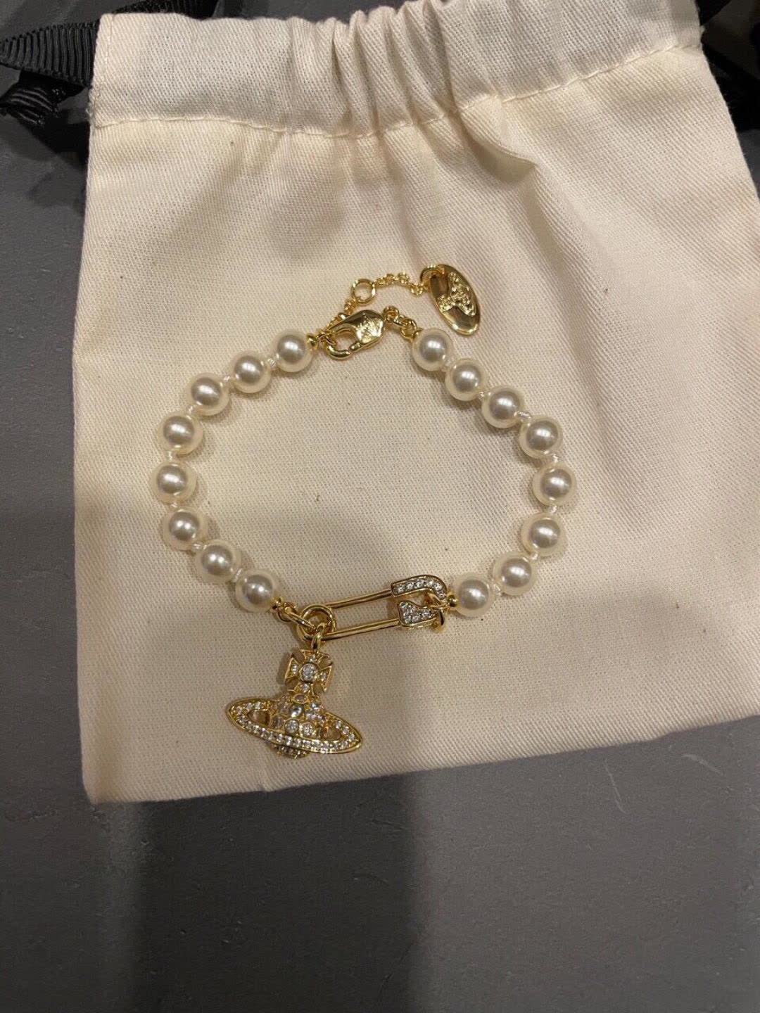 Vivienne Westwood Pearl Bracelet with Orb Charm